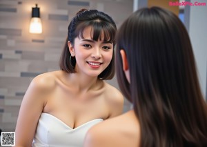 A woman sitting on a counter in front of a mirror.